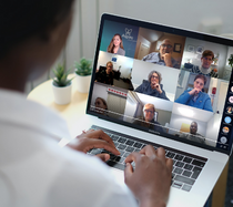 Woman attending virtual Aspire Community Meeting