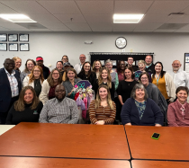 A group of about 20 staff that participated in the Aspire Mentorship Program.